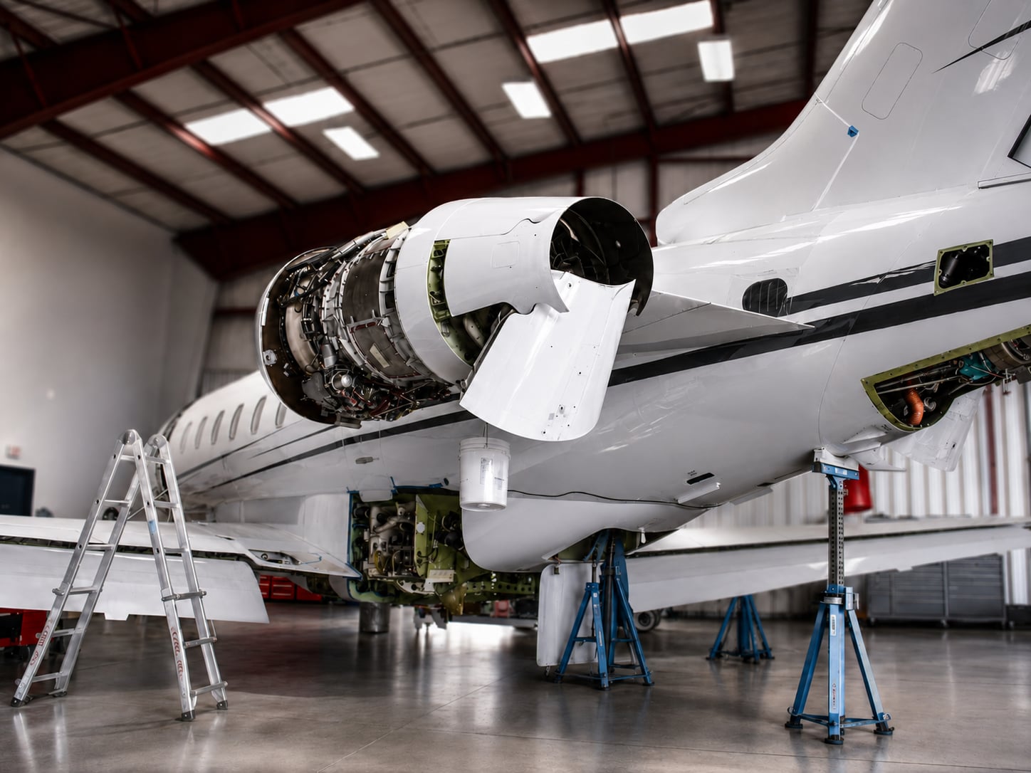 Bombardier Challenger 350 engine cowling open during scheduled maintenance